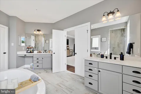 a bedroom with furniture and window