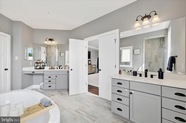 a bedroom with furniture and window