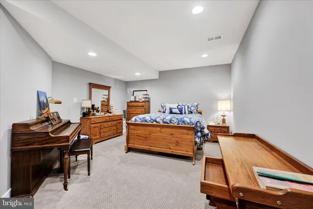 a view of a house with a yard and deck