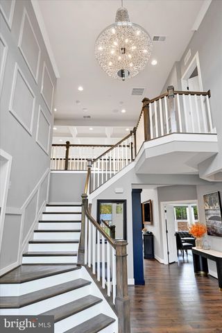 a living room with fireplace furniture and a flat screen tv
