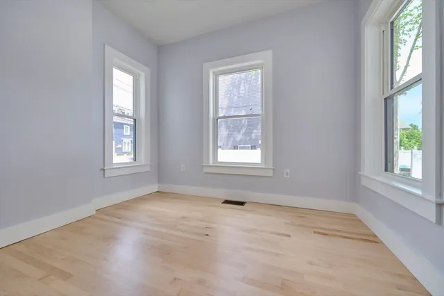 an empty room with windows
