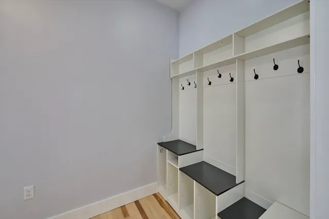 a view of entryway with wooden floor