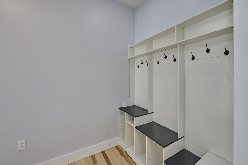 97 Oakton Avenue, Unit 1 Boston, MA 02122 - Photo 18 of 20 a view of entryway with wooden floor
