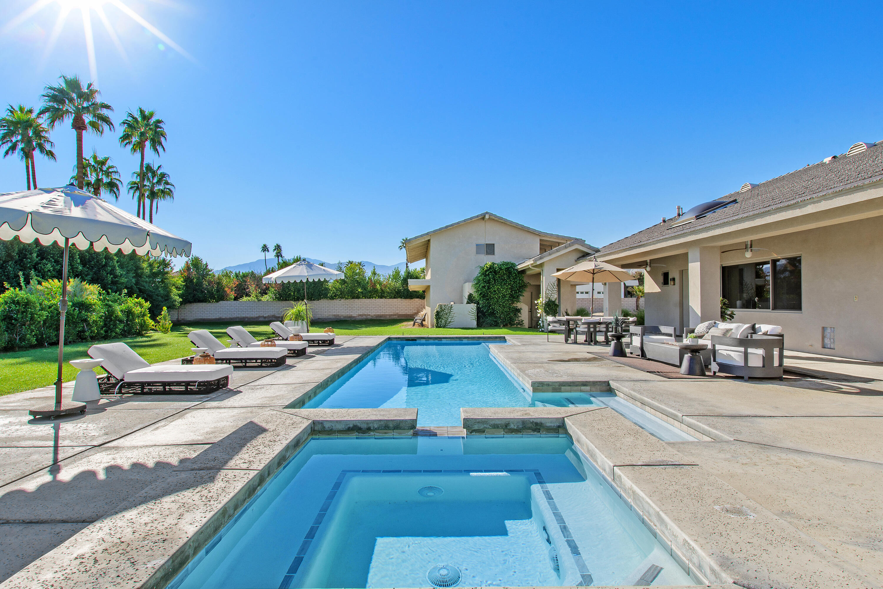 41750 Rancho Manana Lane Rancho Mirage, CA 92270 - Photo 23 of 37 a view of a house with swimming pool and sitting area