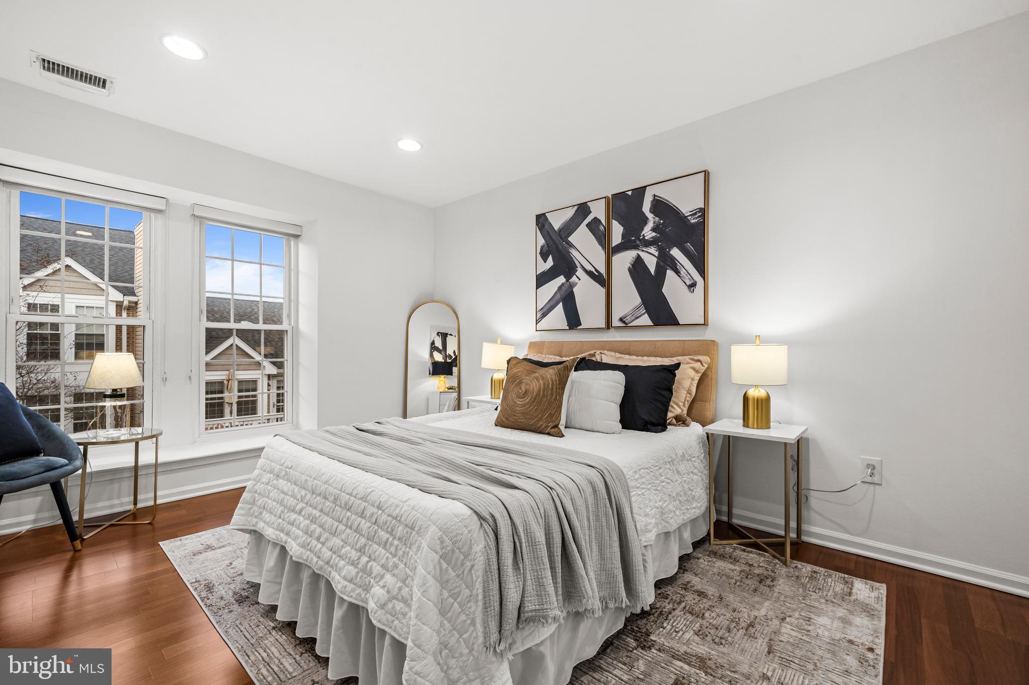 4531 28th Road South, Unit 97 Arlington, VA 22206 - Photo 13 of 32 a bedroom with a bed and a table