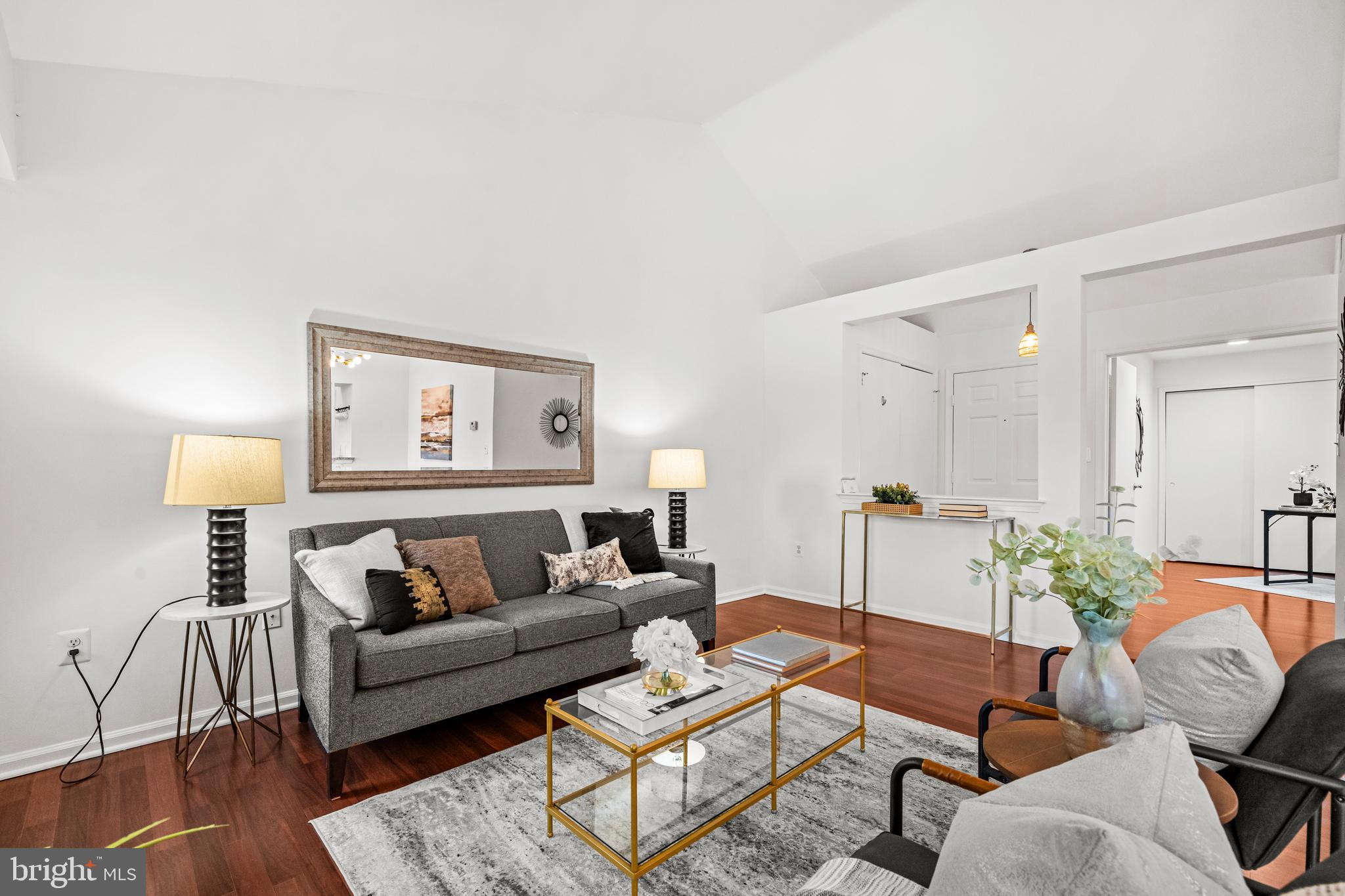 4531 28th Road South, Unit 97 Arlington, VA 22206 - Photo 3 of 32 a living room with furniture and wooden floor