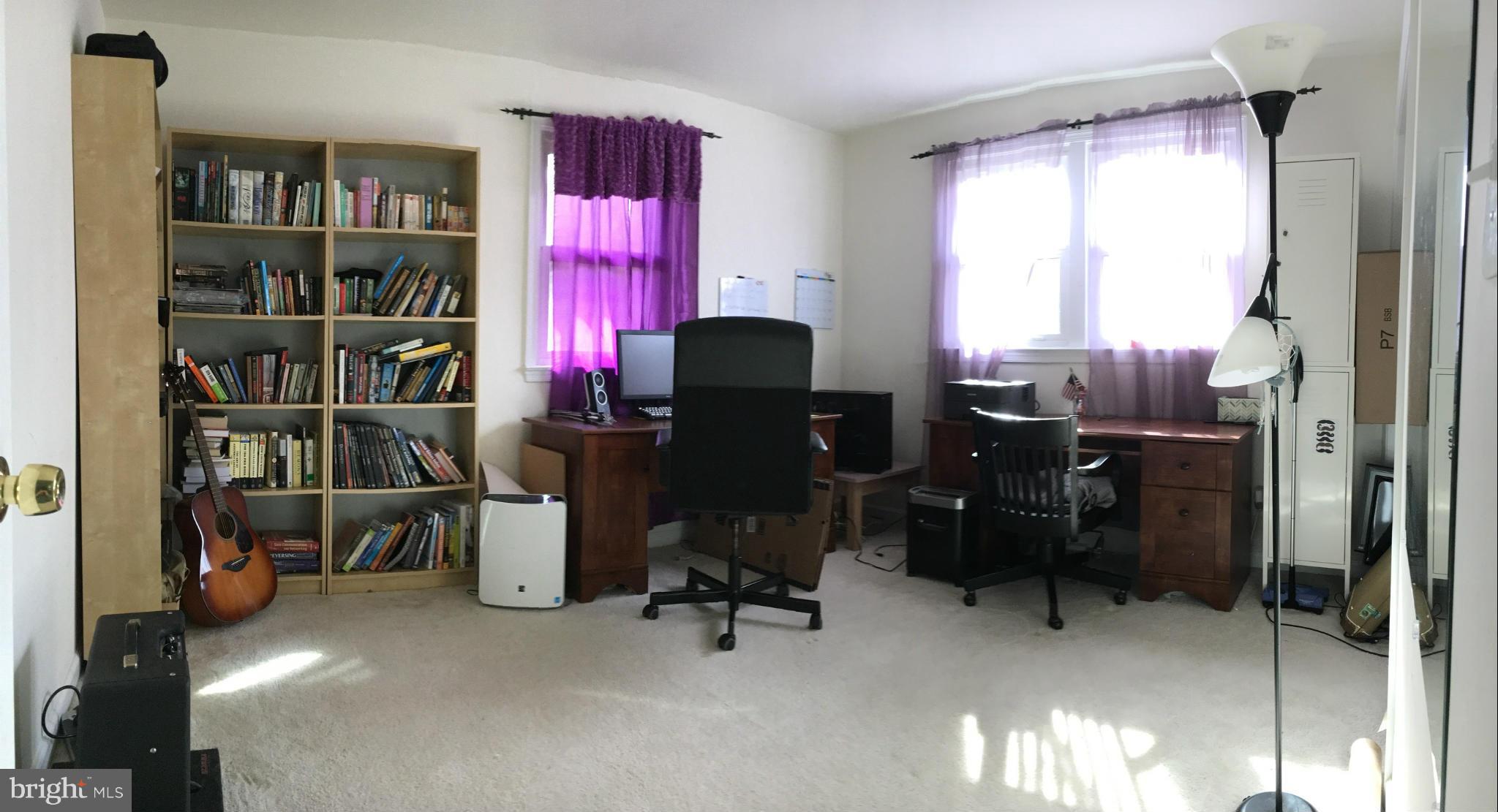 5319 Ravensworth Road Springfield, VA 22151 - Photo 9 of 14 a view of a workspace with furniture and a window