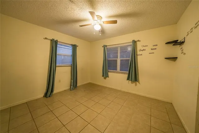 a view of a livingroom with wooden floor