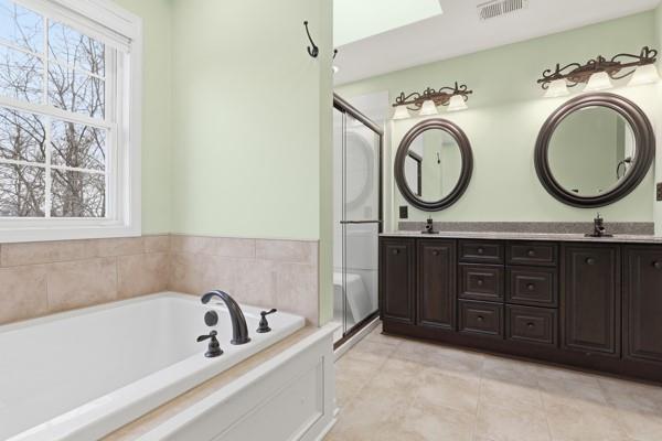 2338 Nicholson Road Sewickley, PA 15143 - Photo 24 of 44 The master bath is complete with shower, soaking tub, and duel vanities. One of two closets is in the master bath.