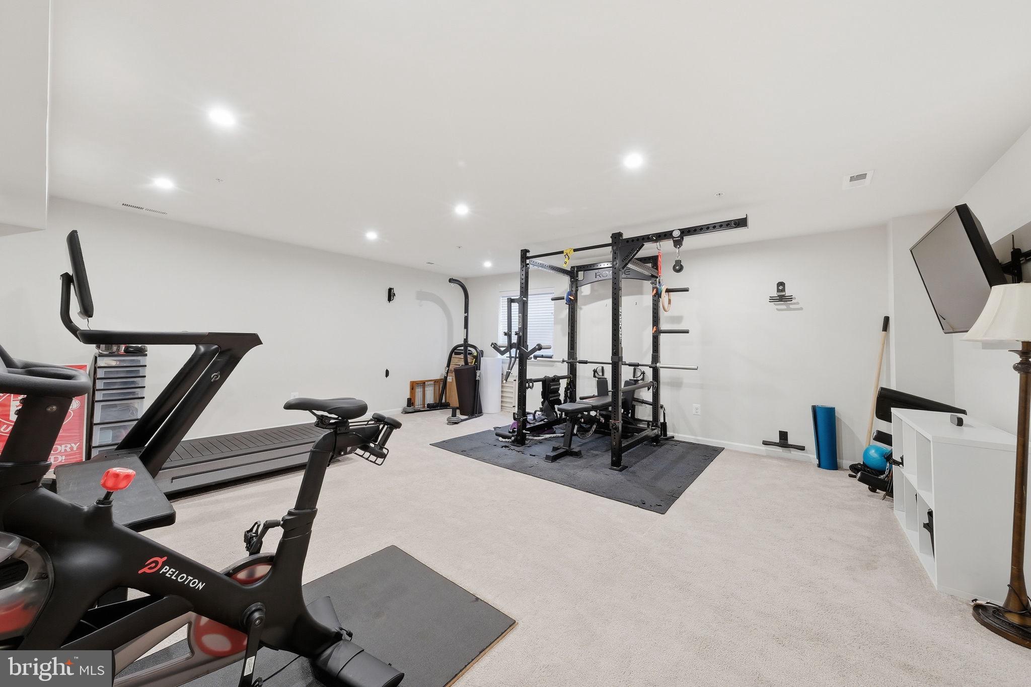 3012 Bretons Ridge Way Hanover, MD 21076 - Photo 5 of 37 a view of a room with gym equipment