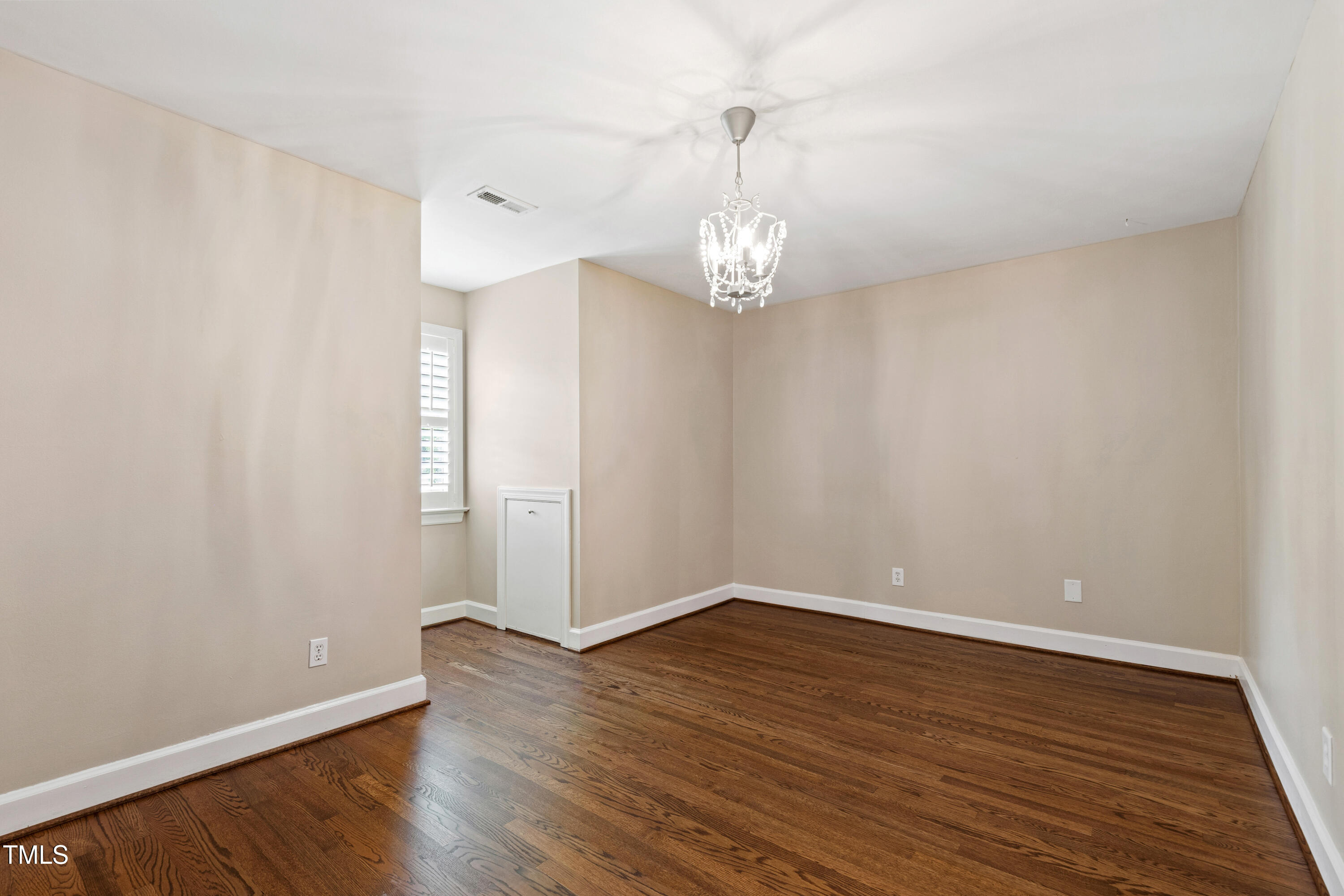 4517 Gates Street Raleigh, NC 27609 - Photo 34 of 66 a view of empty room with wooden floor
