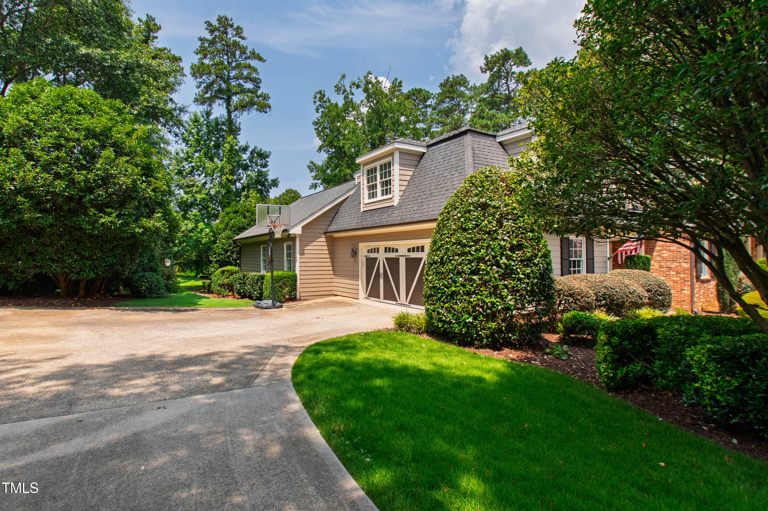 4517 Gates Street Raleigh, NC 27609 - Photo 62 of 66 front view of a house with a yard
