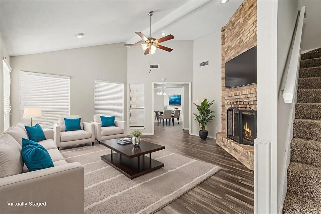 124 Summit Cove Trophy Club, TX 76262 - Photo 3 of 23 a living room with furniture and a fireplace