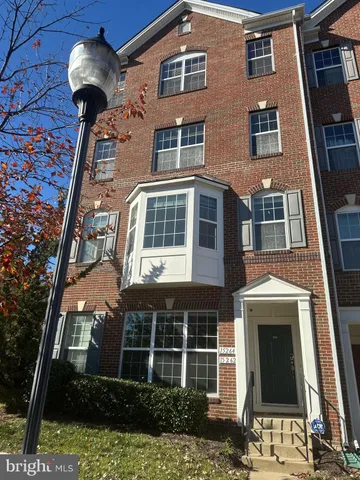 a front view of a multi story residential apartment building