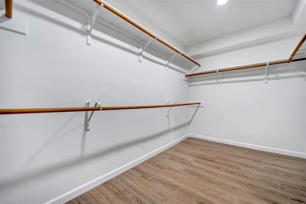 a view of a room with racks on the wall