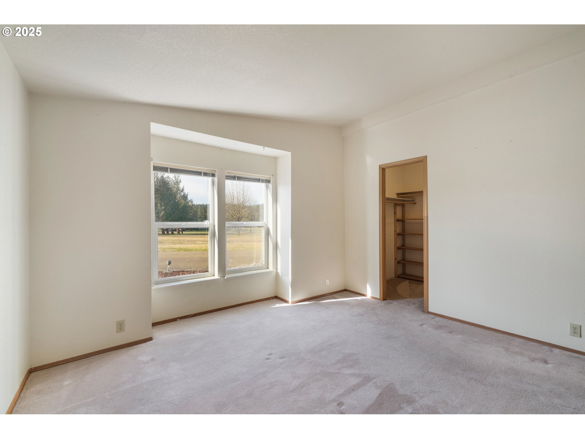9776 South Prairie Road Tillamook, OR 97141 - Photo 21 of 38 a view of an empty room with a window