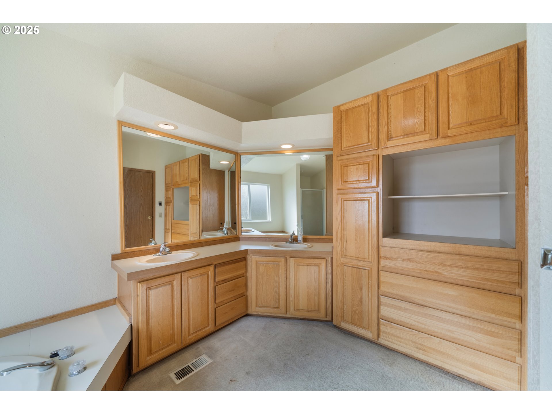 9776 South Prairie Road Tillamook, OR 97141 - Photo 28 of 38 a kitchen with stainless steel appliances granite countertop a sink and cabinets