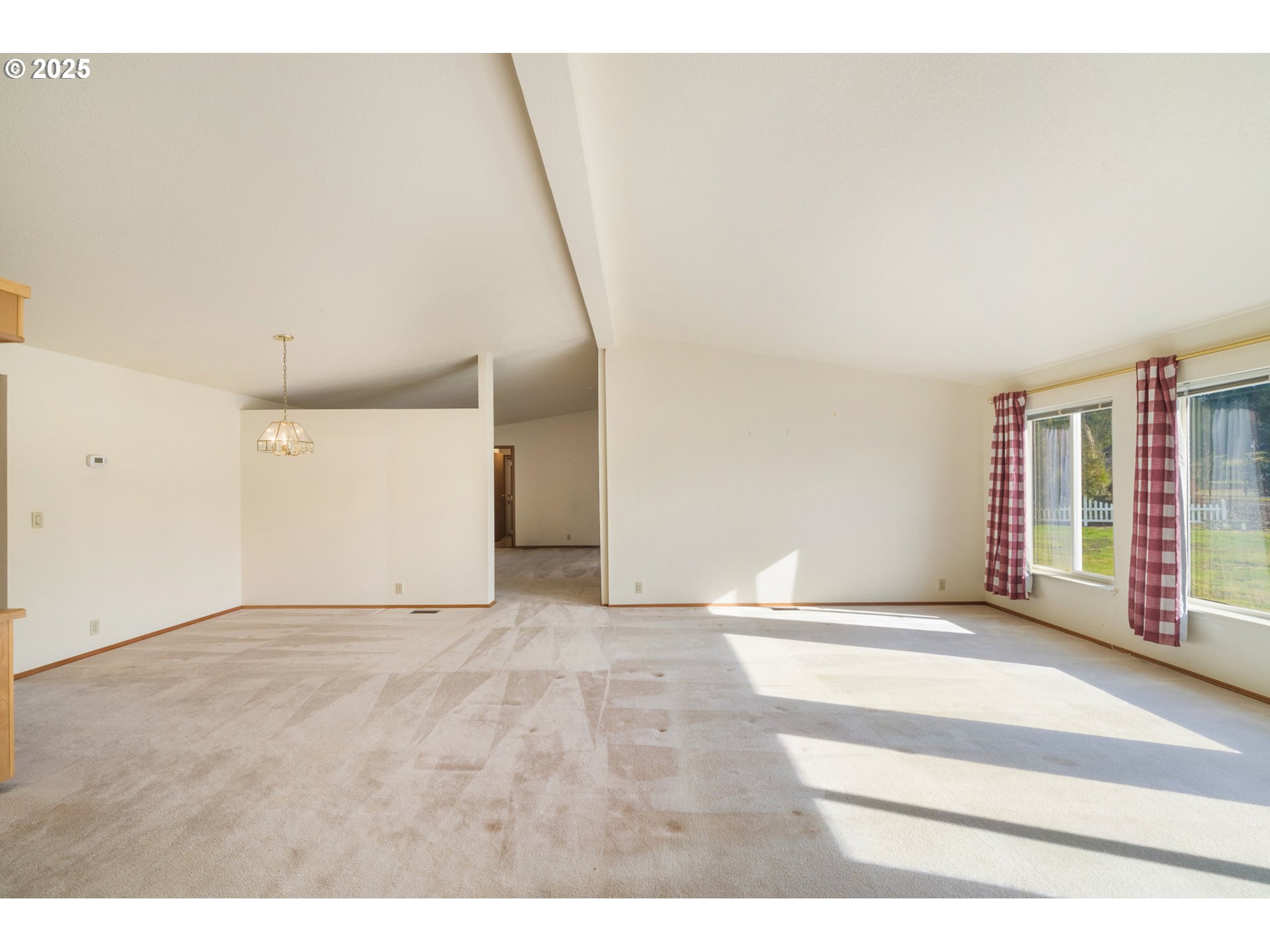 9776 South Prairie Road Tillamook, OR 97141 - Photo 7 of 38 a view of an empty room with a window