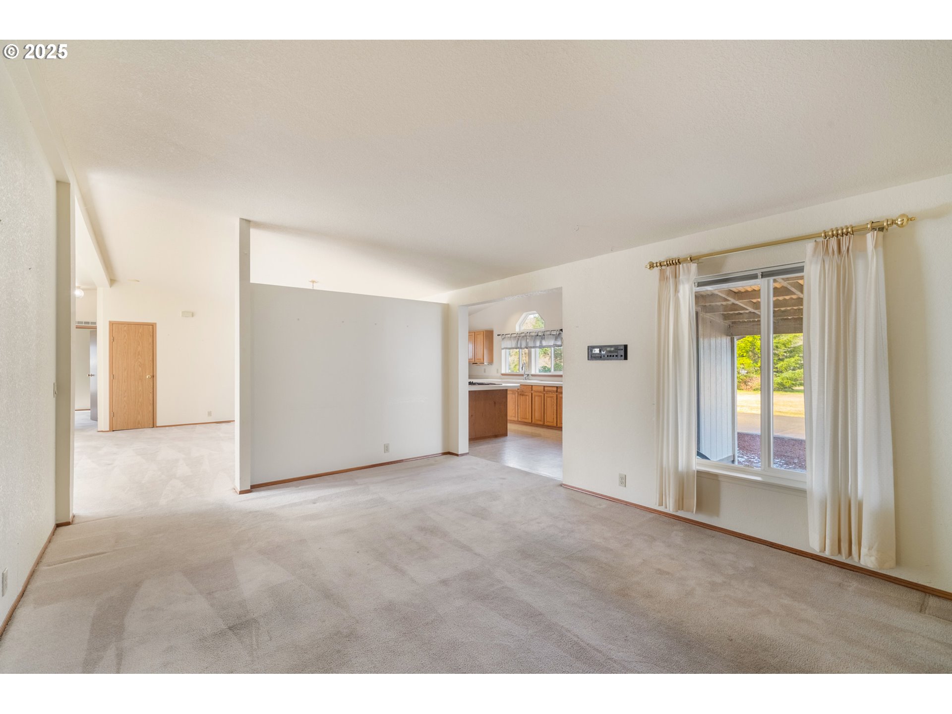 9776 South Prairie Road Tillamook, OR 97141 - Photo 10 of 38 a view of an empty room with a window