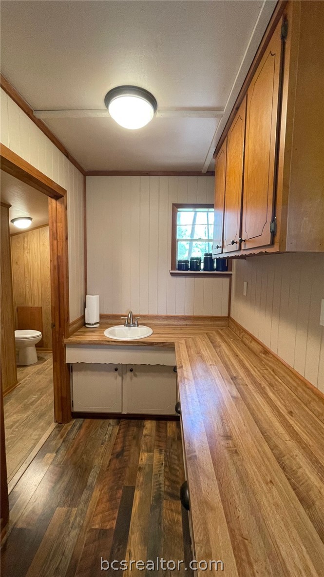 Tbd Tbd Wilson Pasture Road Bryan, TX 77808 - Photo 10 of 29 a room with wooden floor and furniture
