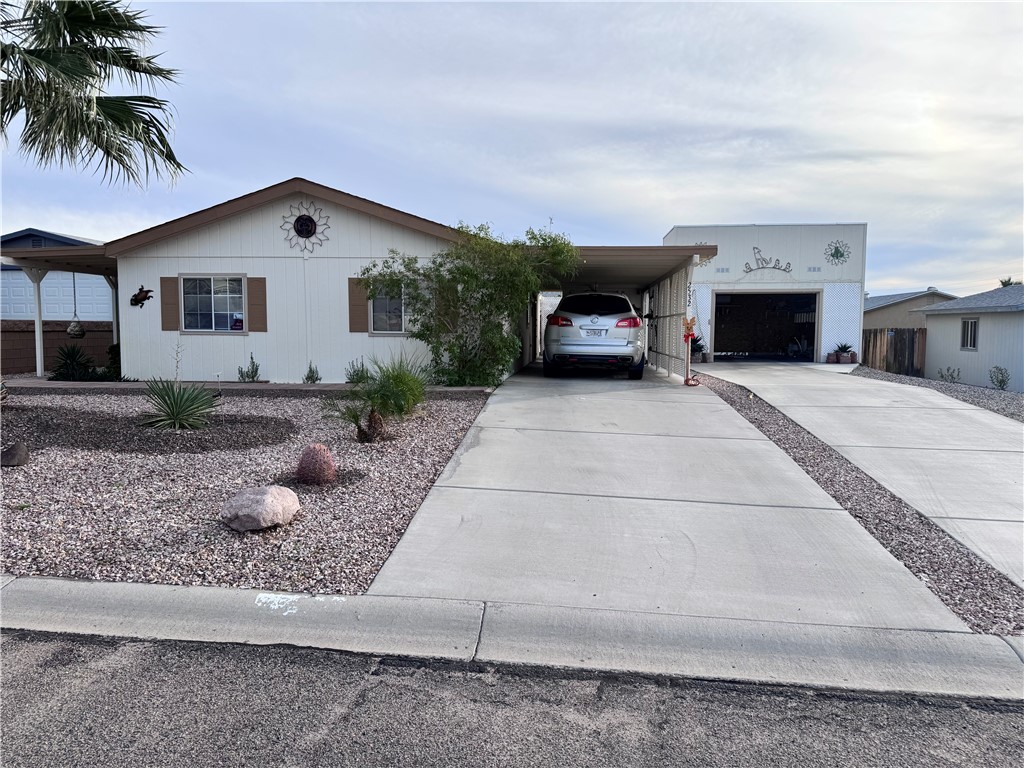 2532 Morgan Road Fort Mohave, AZ 86426 - Photo 1 of 29 View of front of property featuring driveway and an attached carport