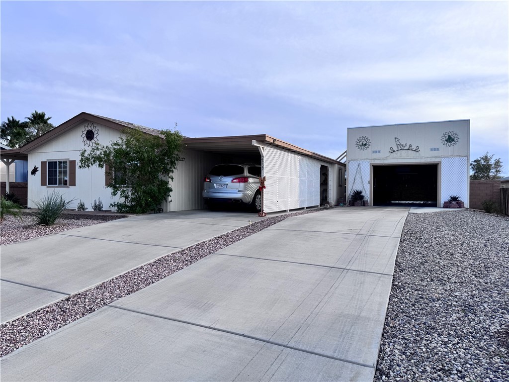 2532 Morgan Road Fort Mohave, AZ 86426 - Photo 2 of 29 Single story home featuring concrete driveway and a carport