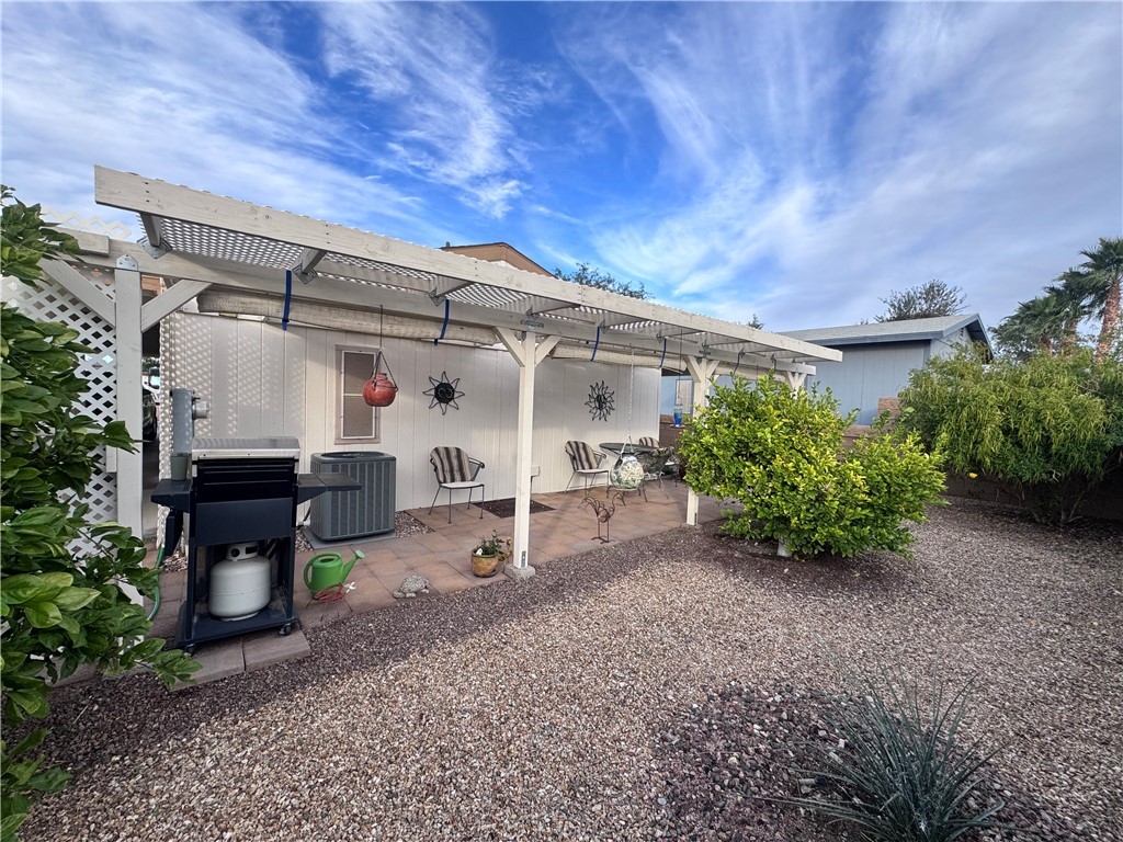 2532 Morgan Road Fort Mohave, AZ 86426 - Photo 23 of 29 Back of property featuring a pergola and a patio