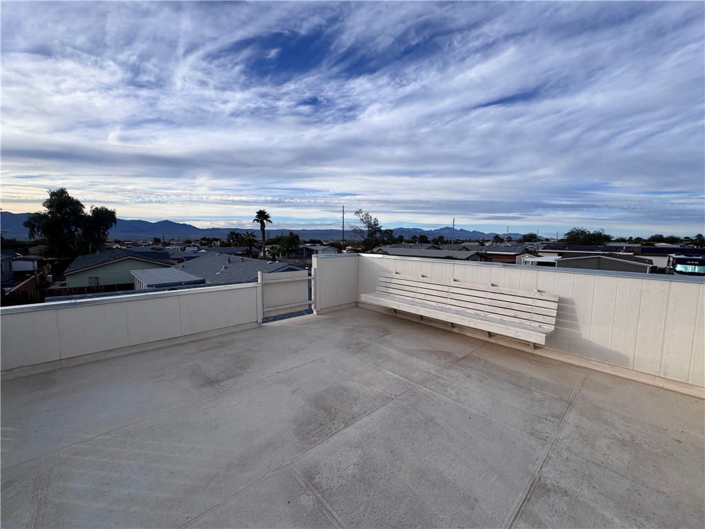 2532 Morgan Road Fort Mohave, AZ 86426 - Photo 28 of 29 View of patio / terrace with a mountain view and a gate