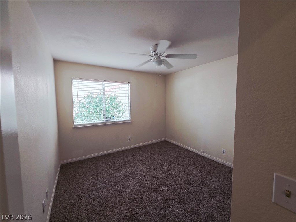 2920 Setting Sun Street Las Vegas, NV 89117 - Photo 31 of 43 This cozy bedroom features plush carpeting and abundant natural light from a large window.