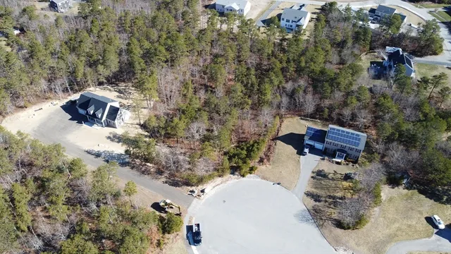 an aerial view of residential house with outdoor space