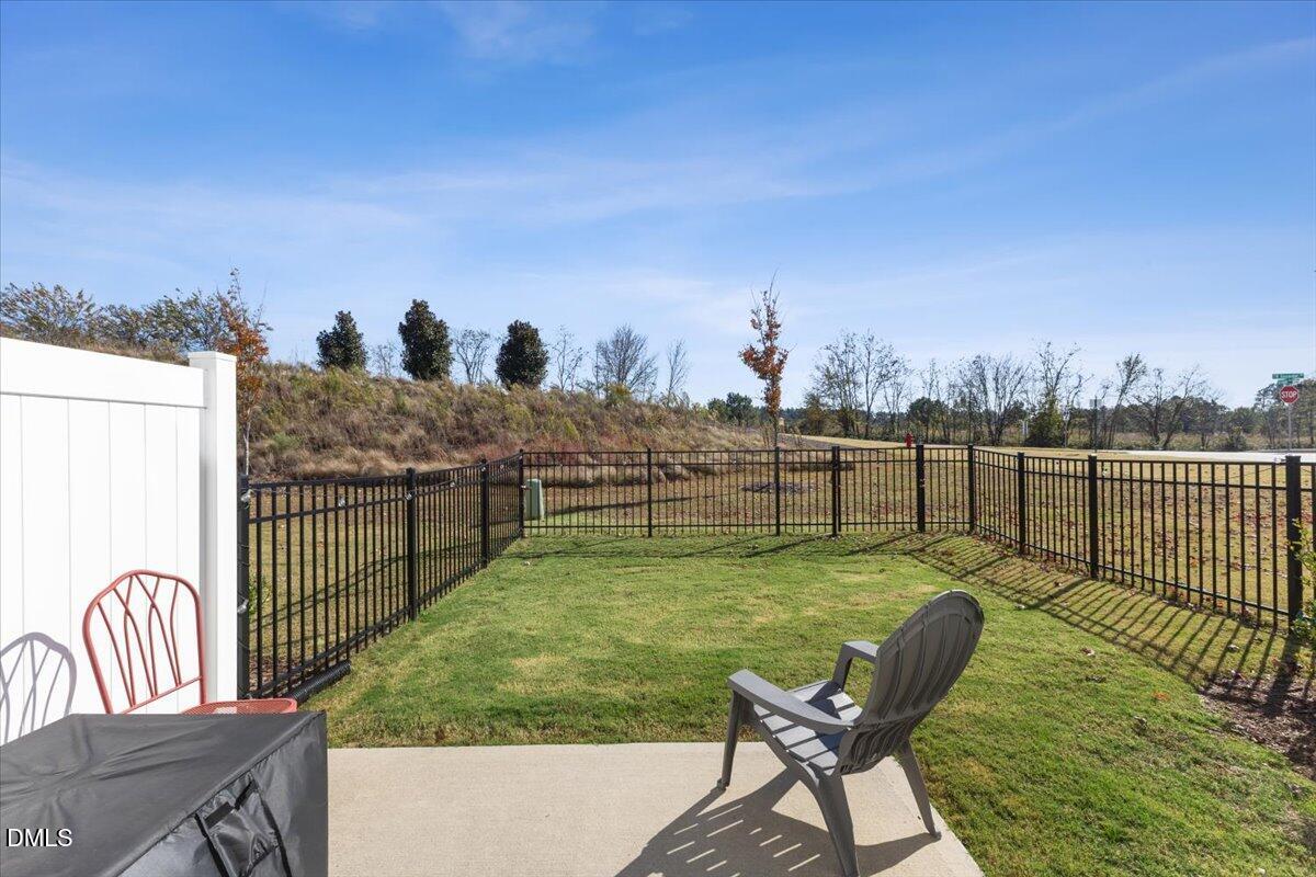 704 Colby Place Durham, NC 27713 - Photo 31 of 34 a view of a swimming pool with a lounge chairs
