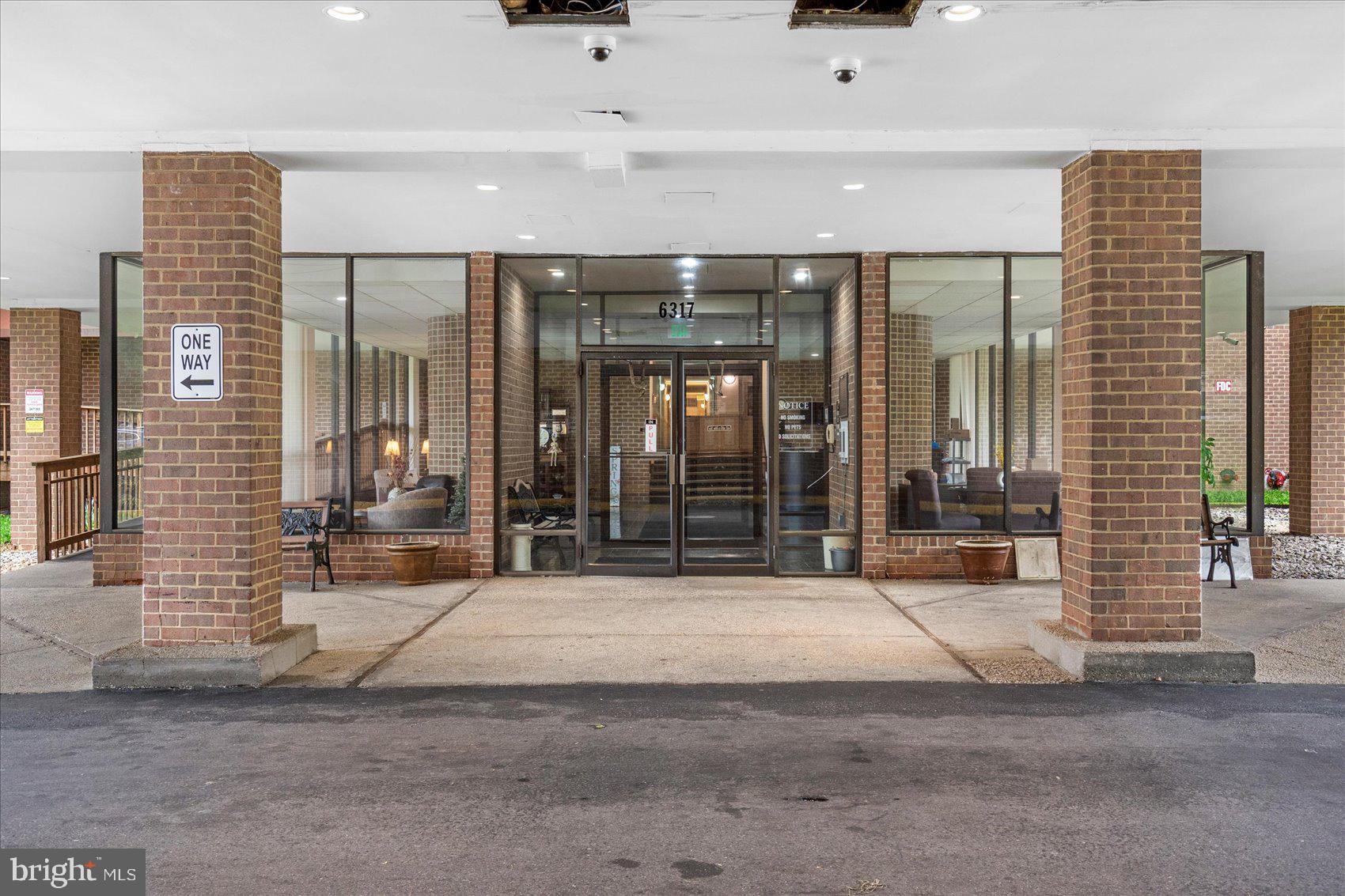 6317 Park Heights Avenue, Unit 616 Baltimore, MD 21215 - Photo 2 of 36 a view of entrance gate of a building