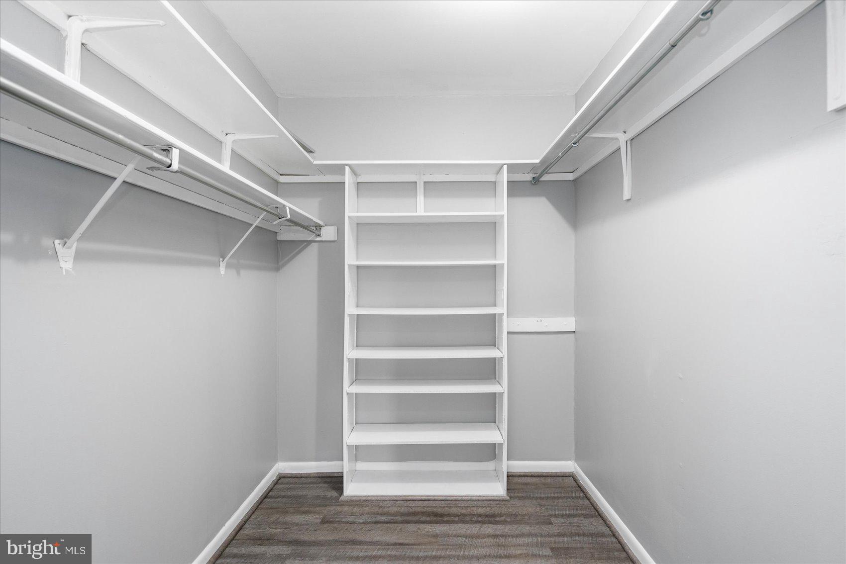 6317 Park Heights Avenue, Unit 616 Baltimore, MD 21215 - Photo 27 of 36 a view of walk in closet with empty racks