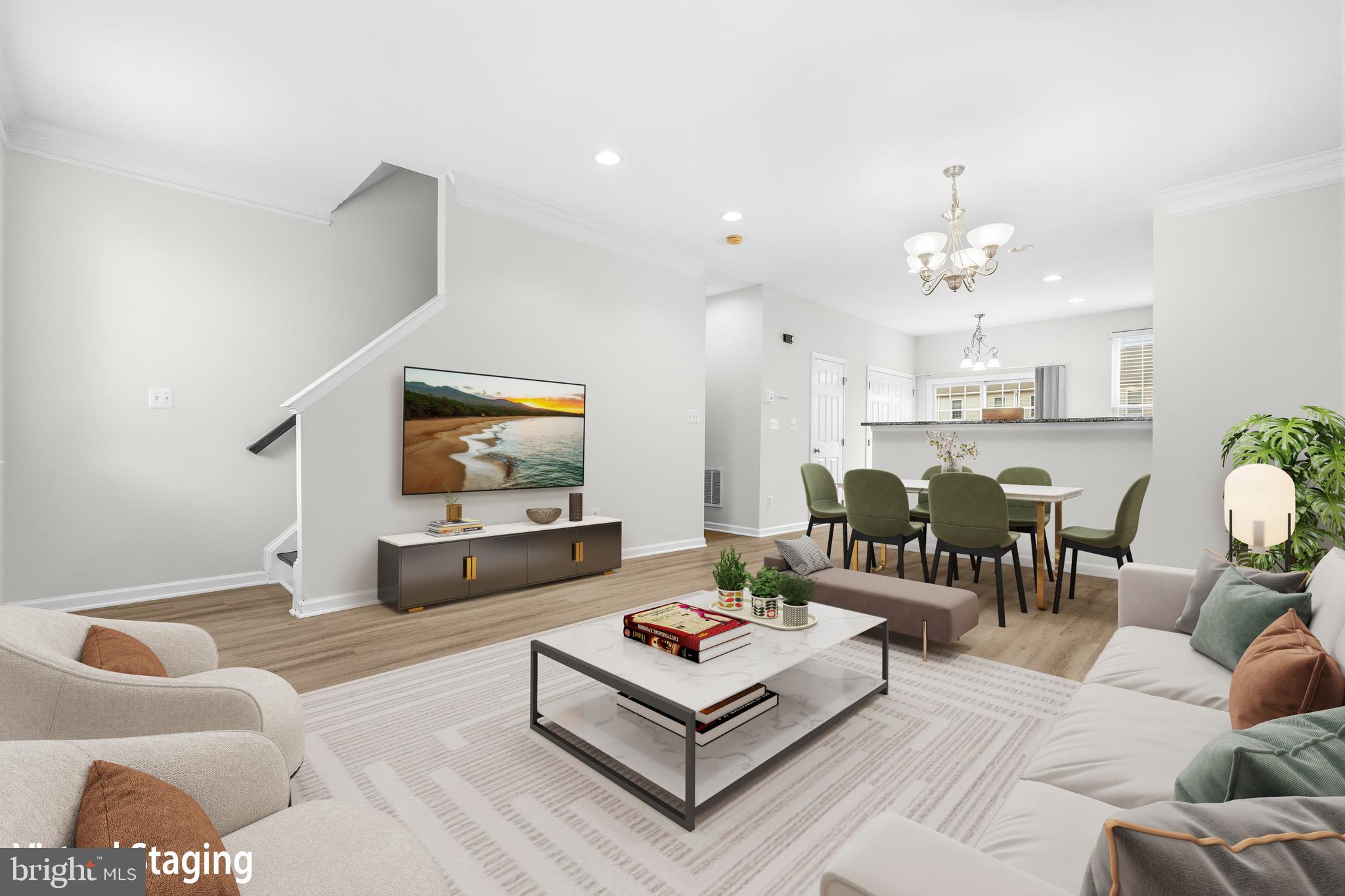 25154 Monteith Terrace Chantilly, VA 20152 - Photo 6 of 40 a living room with furniture and a flat screen tv