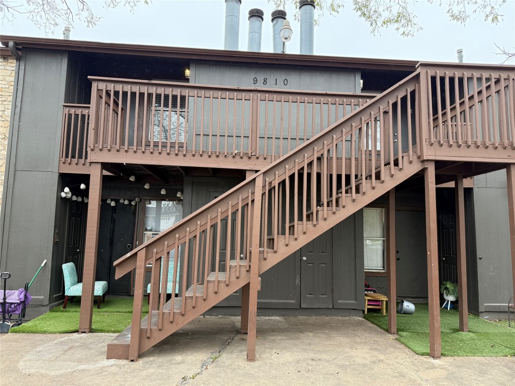 9810 Roxanna Drive, Unit C Austin, TX 78748 - Photo 1 of 10 a view of a house with wooden stairs