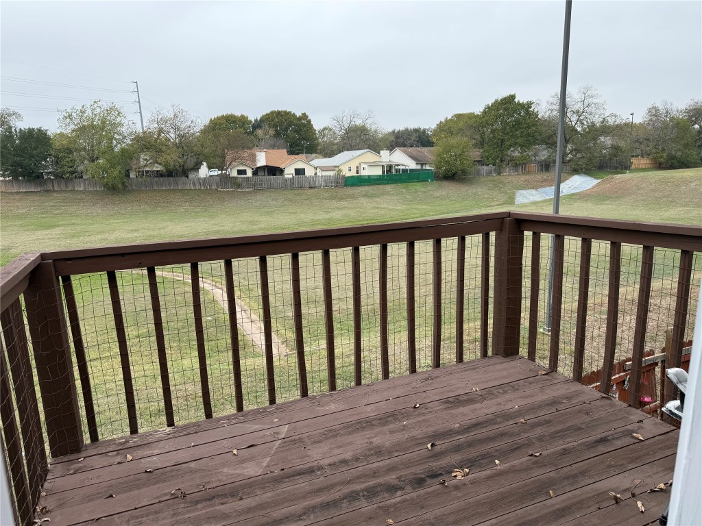 9810 Roxanna Drive, Unit C Austin, TX 78748 - Photo 9 of 10 a balcony with wooden floor