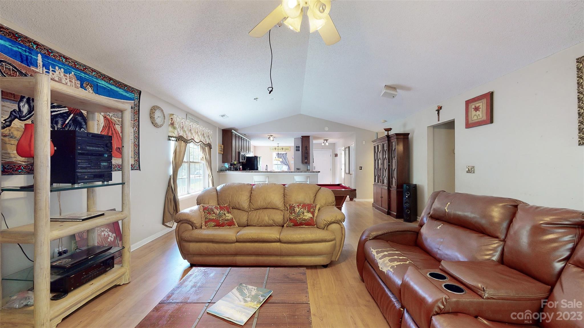 11506 Woodfire Road Charlotte, NC 28269 - Photo 28 of 48 a living room with furniture and a rug