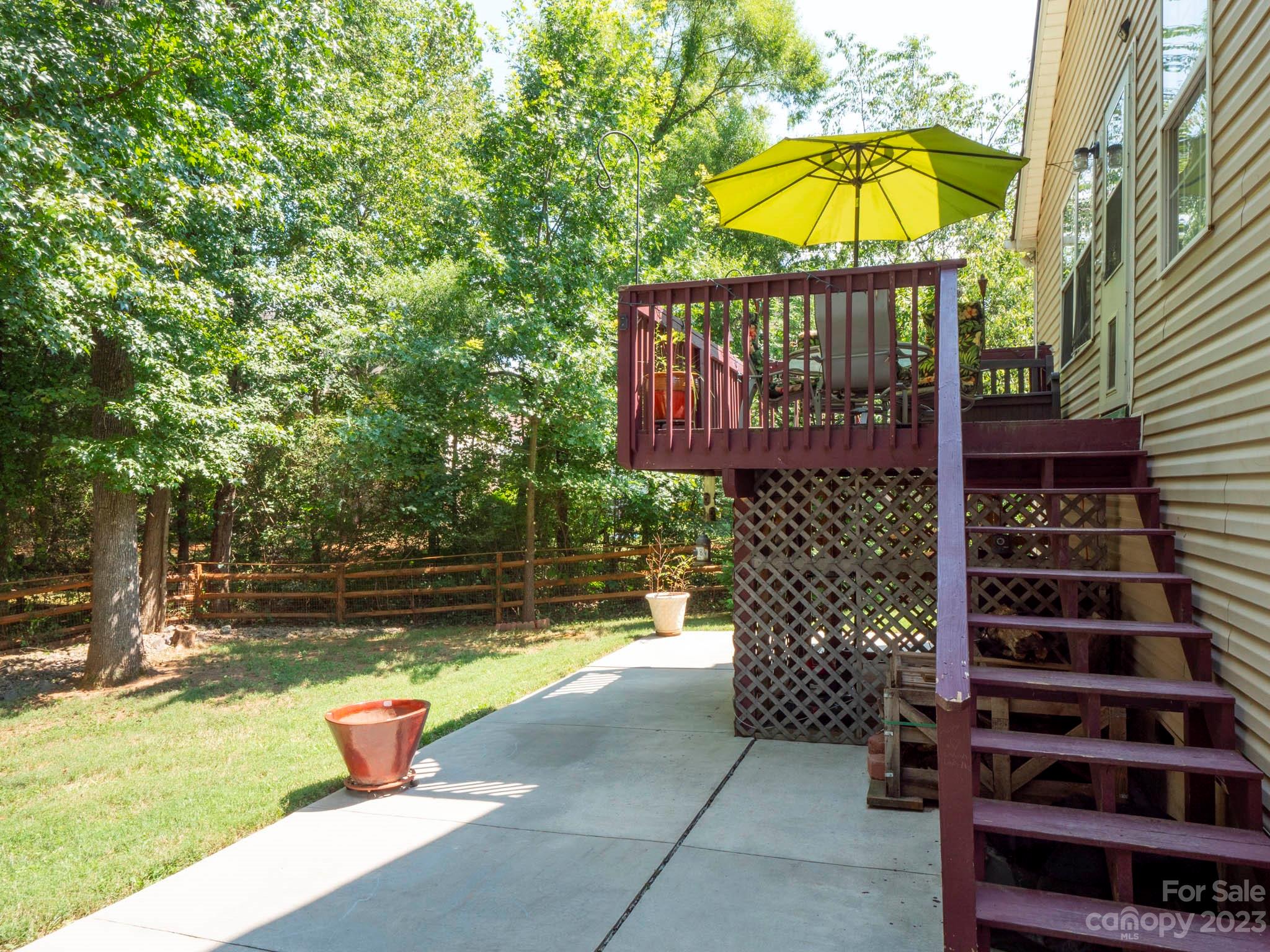 11506 Woodfire Road Charlotte, NC 28269 - Photo 44 of 48 a view of swimming pool outdoor seating and city view