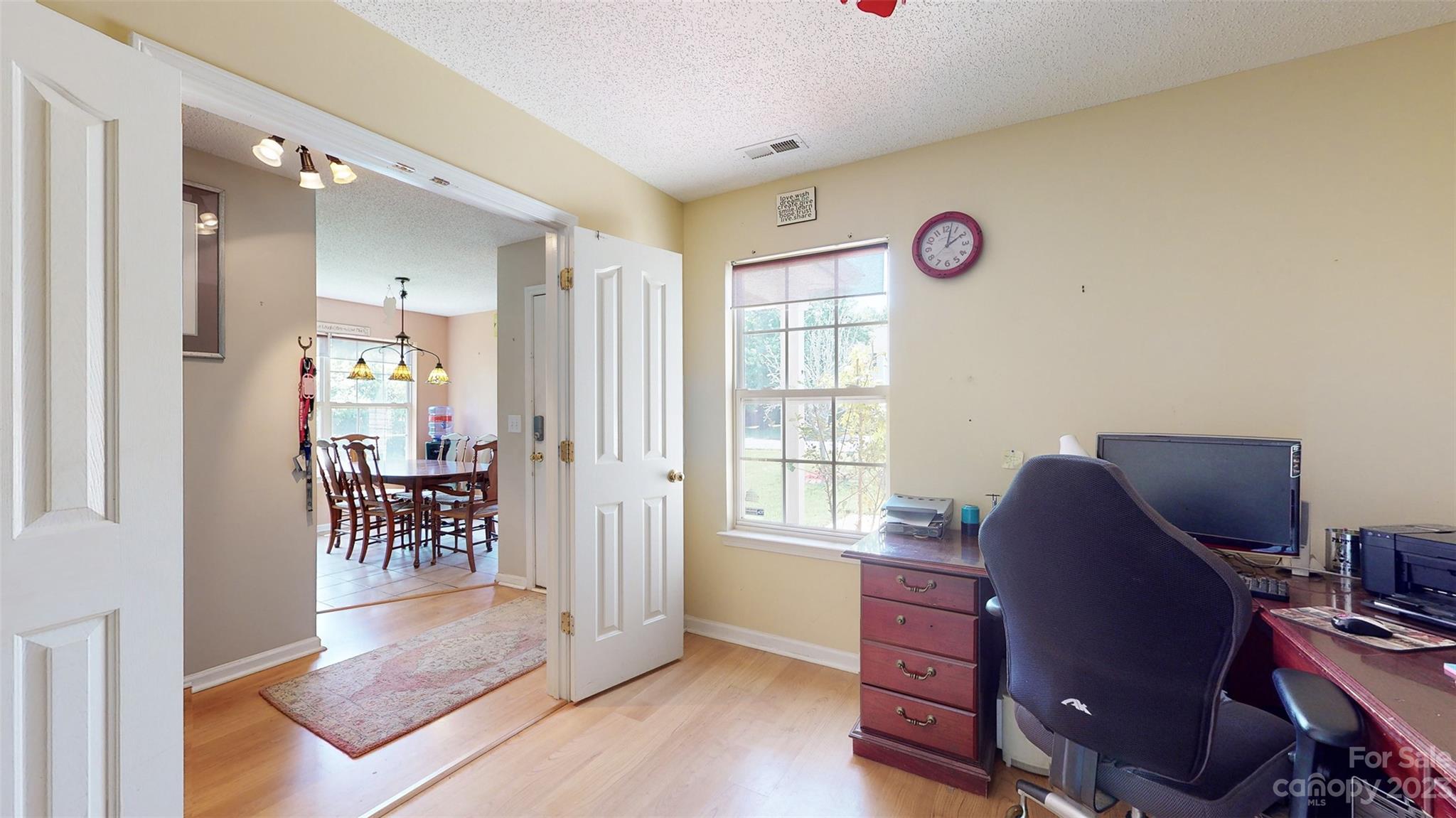 11506 Woodfire Road Charlotte, NC 28269 - Photo 9 of 48 a workspace with furniture and window