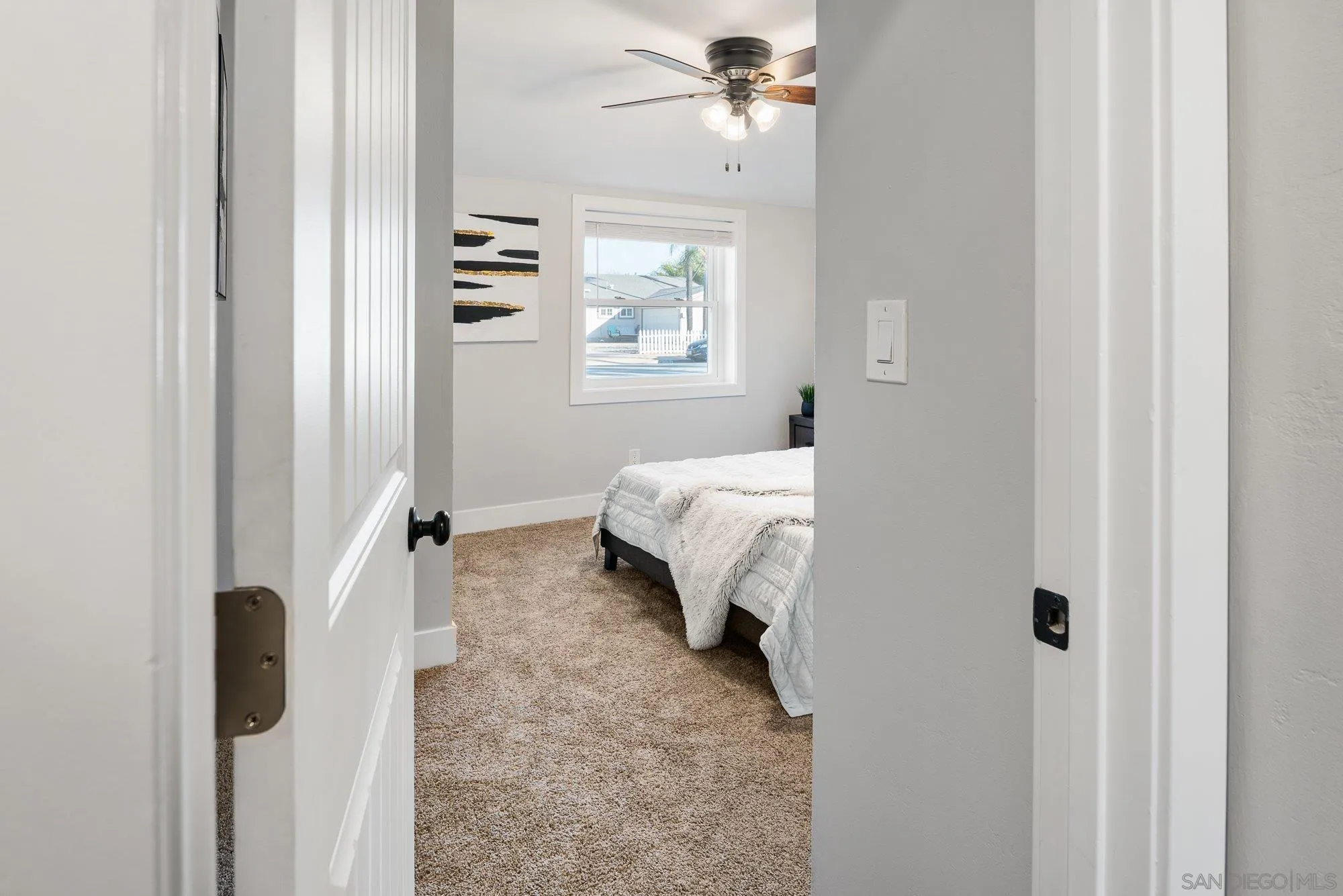 222 Gull Place El Cajon, CA 92019 - Photo 18 of 53 a bedroom with a bed and a window