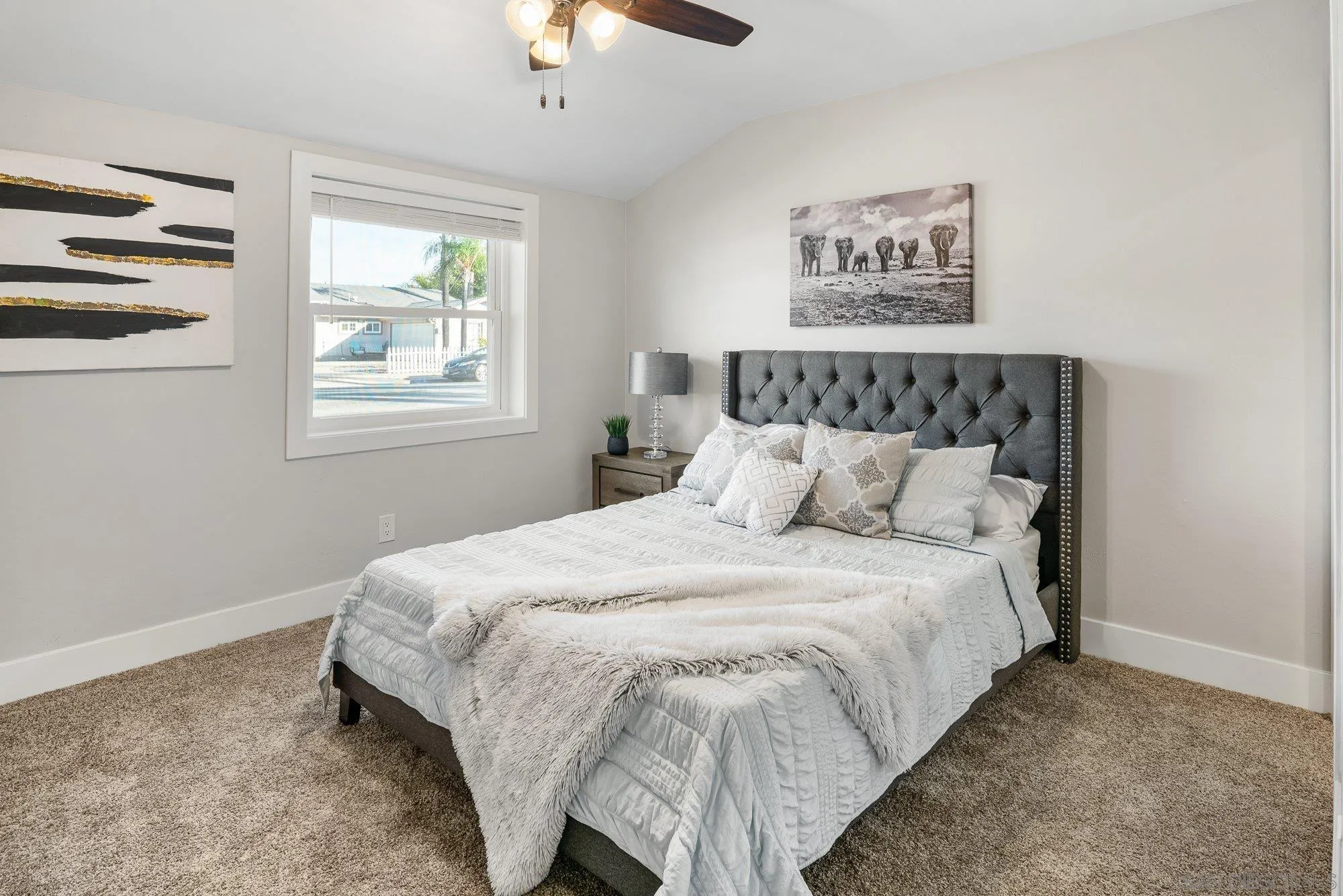 222 Gull Place El Cajon, CA 92019 - Photo 19 of 53 a large bed sitting in a bedroom next to a window
