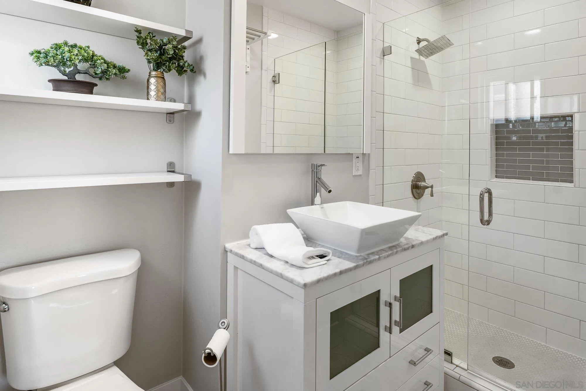 222 Gull Place El Cajon, CA 92019 - Photo 21 of 53 a bathroom with a sink toilet and shower