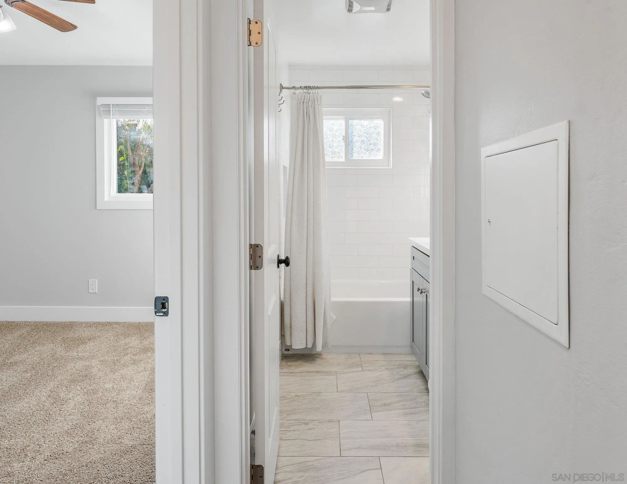 222 Gull Place El Cajon, CA 92019 - Photo 26 of 53 a view of a bathroom with a hallway to toilet