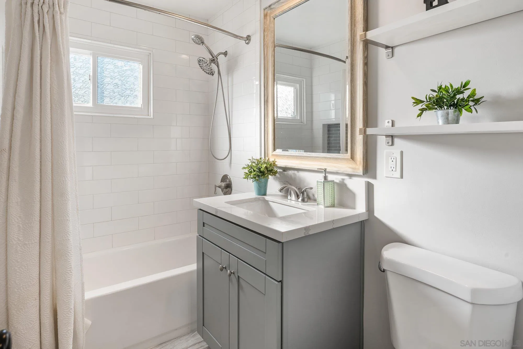 222 Gull Place El Cajon, CA 92019 - Photo 27 of 53 a bathroom with a sink a toilet and a bathtub