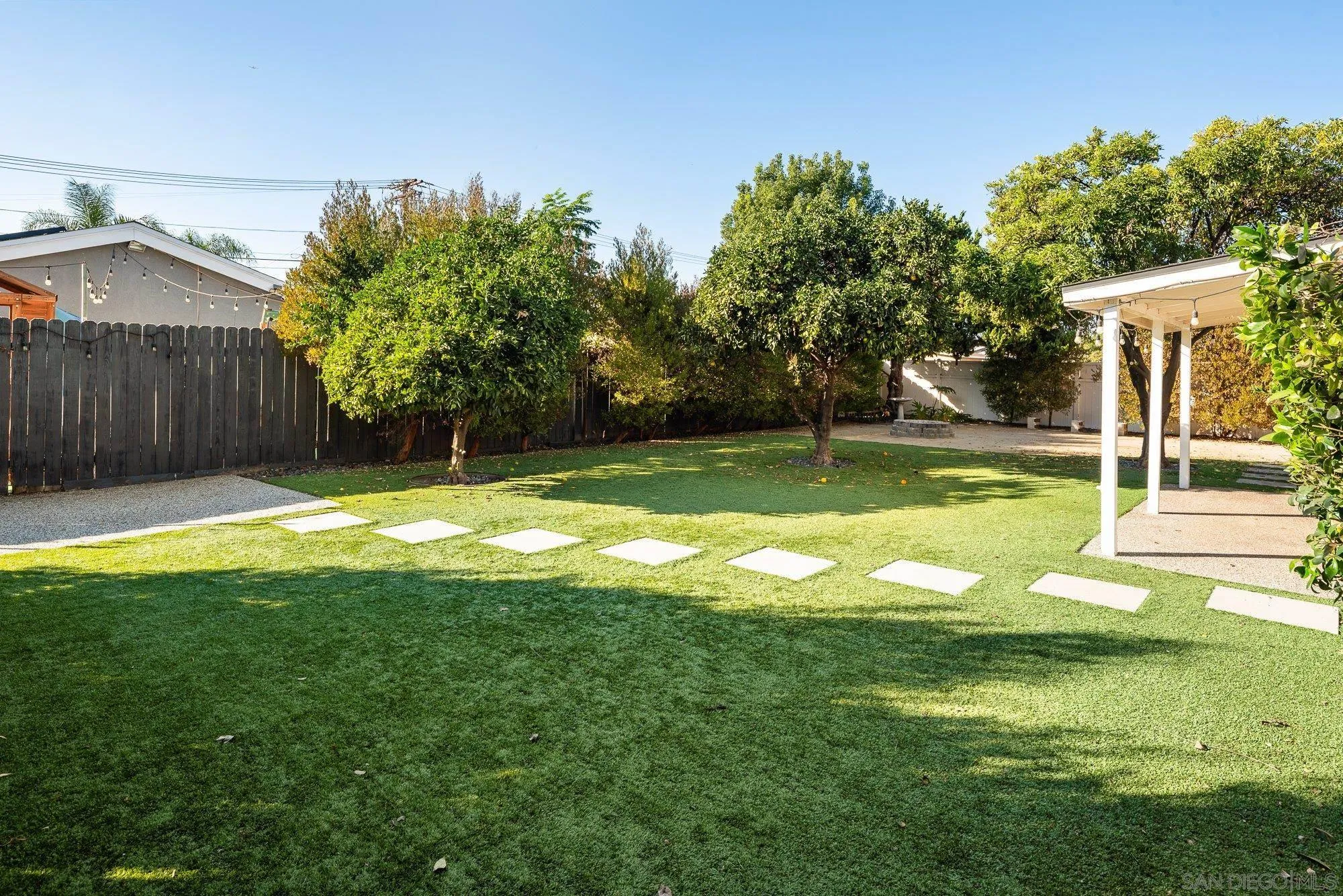 222 Gull Place El Cajon, CA 92019 - Photo 32 of 53 a view of a backyard with a small cabin