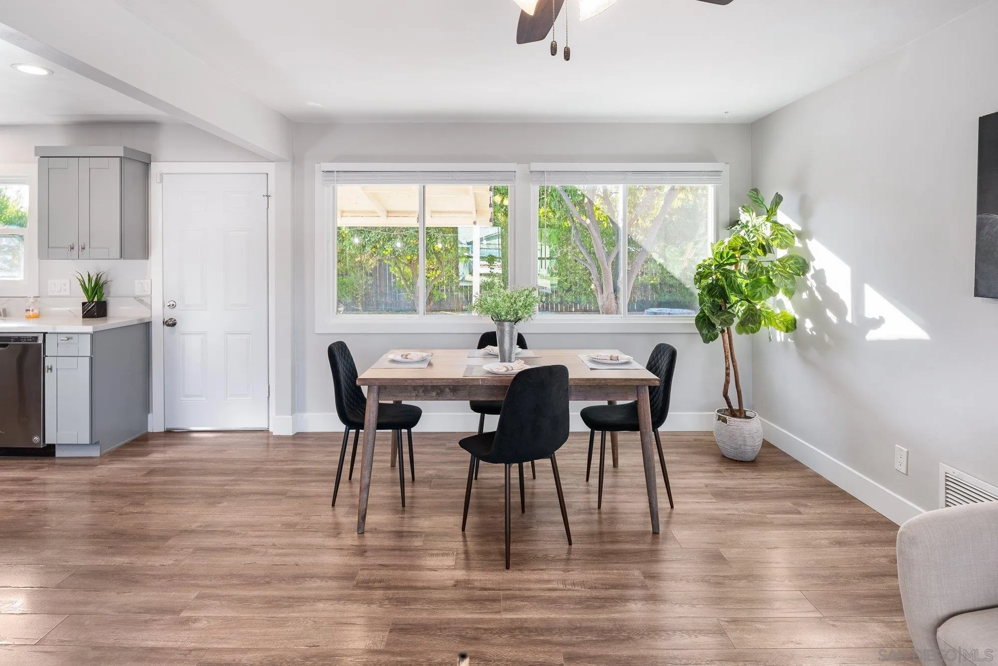 222 Gull Place El Cajon, CA 92019 - Photo 7 of 53 a view of a dining room with furniture and wooden floor
