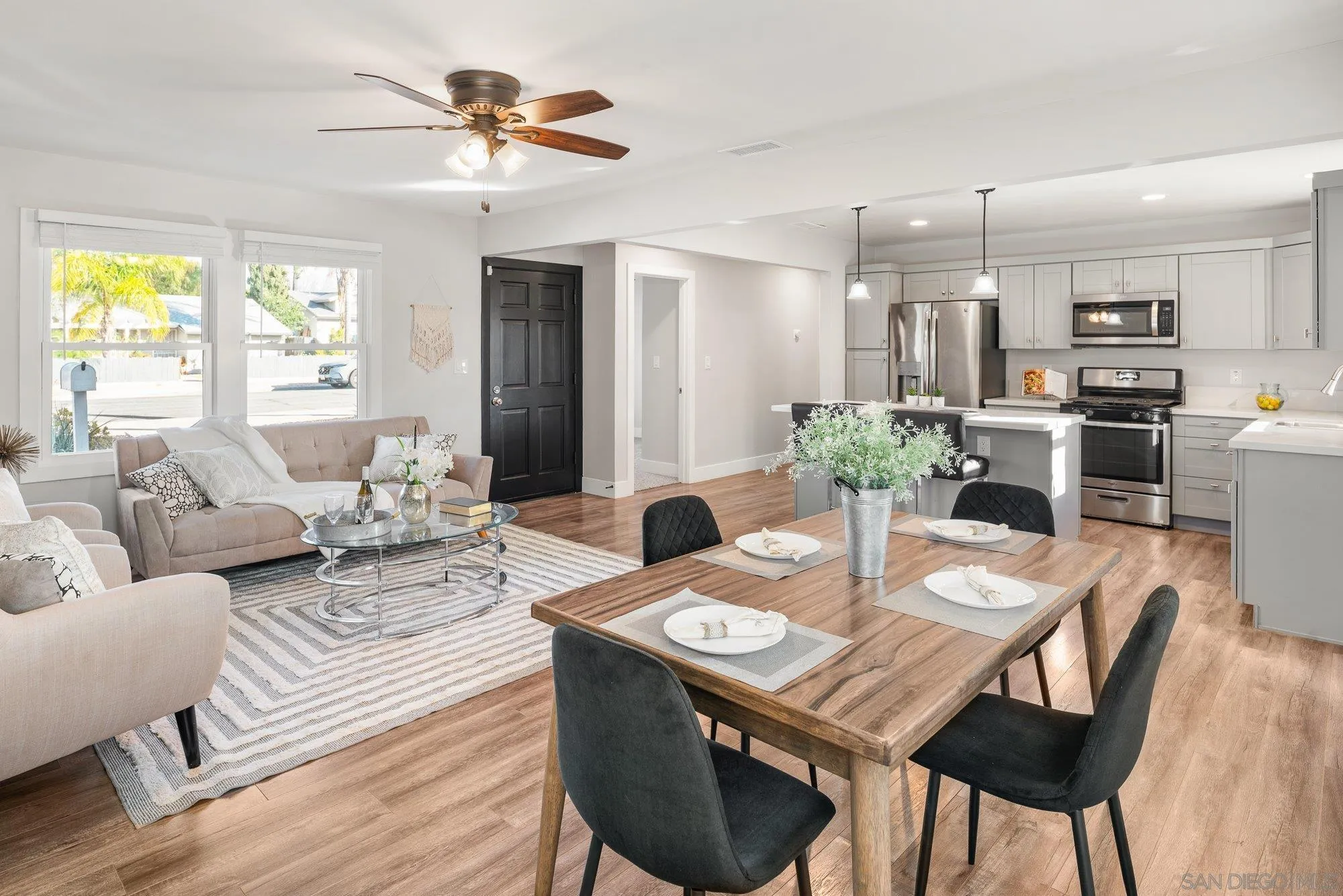 222 Gull Place El Cajon, CA 92019 - Photo 8 of 53 a view of a dining room with furniture and wooden floor