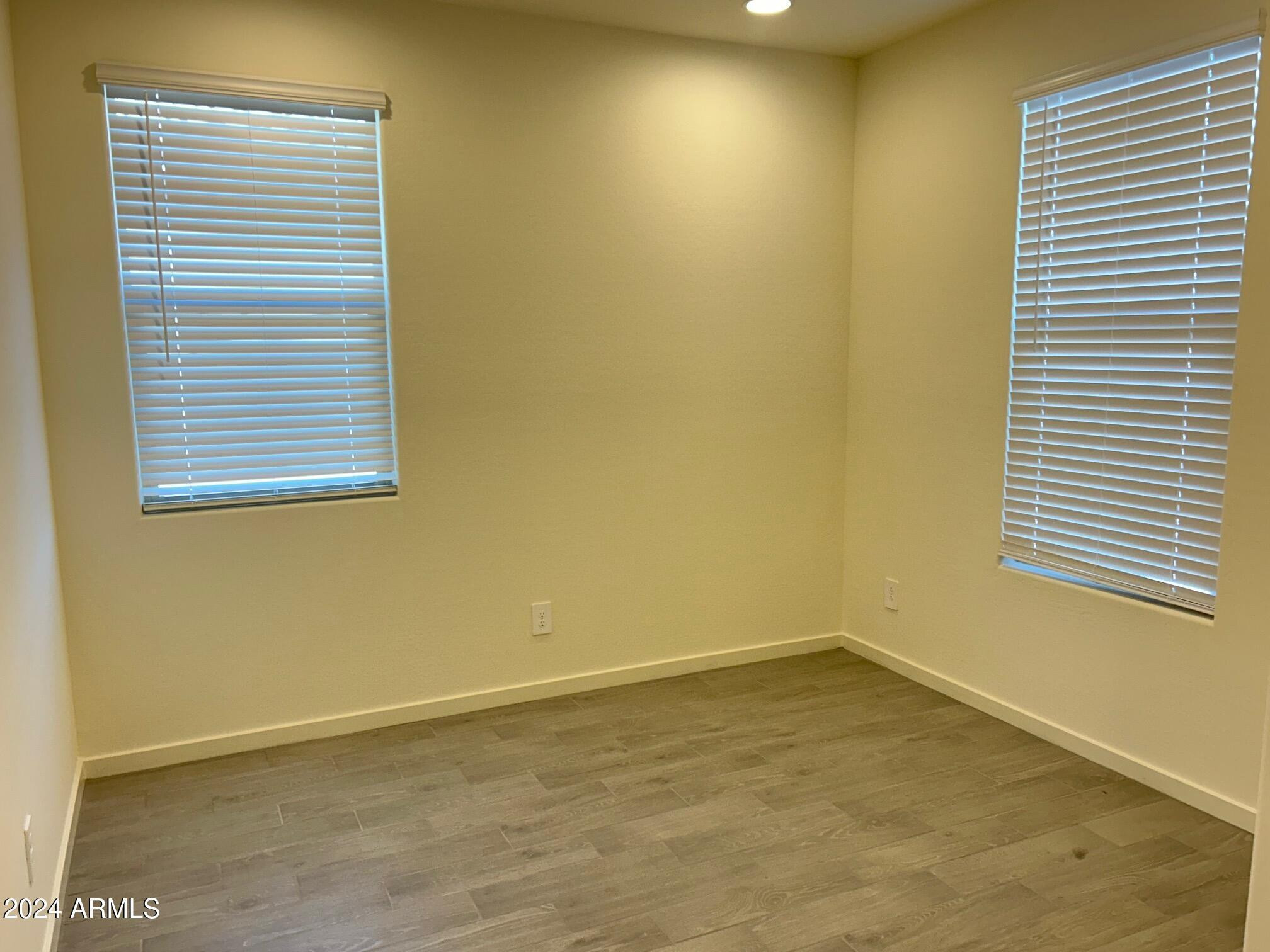 20520 North Candlelight Road Maricopa, AZ 85138 - Photo 2 of 18 an empty room with a window