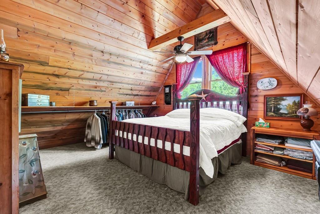 355 Dillon Gribble Road Sparta, TN 38583 - Photo 22 of 45 a bedroom with a bed and a window