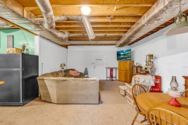 a room with furniture and a window